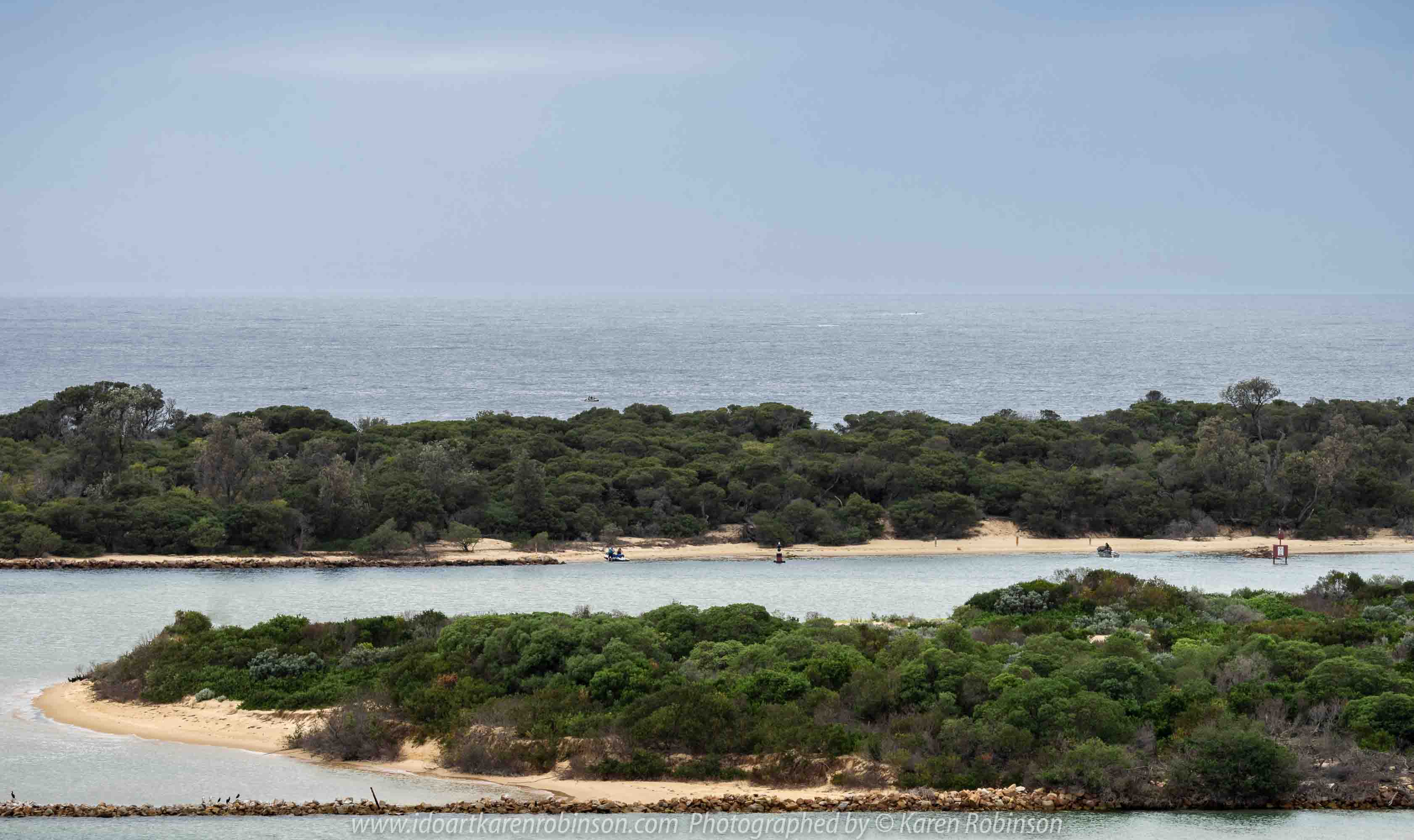 Lakes Entrance, Victoria - Australia 'Shoreline and Harbour Views' Photographed by Karen Robinson January 2019 Comments - On our way to see hubby's brother, we made a slight detour to visit this area. The weather was overcast but still pleasant. It was difficult to photography scenes I wanted and I realised that aerial shots would be best, so we went to a couple of lookouts to help capture some overview shots of Lakes Entrance.