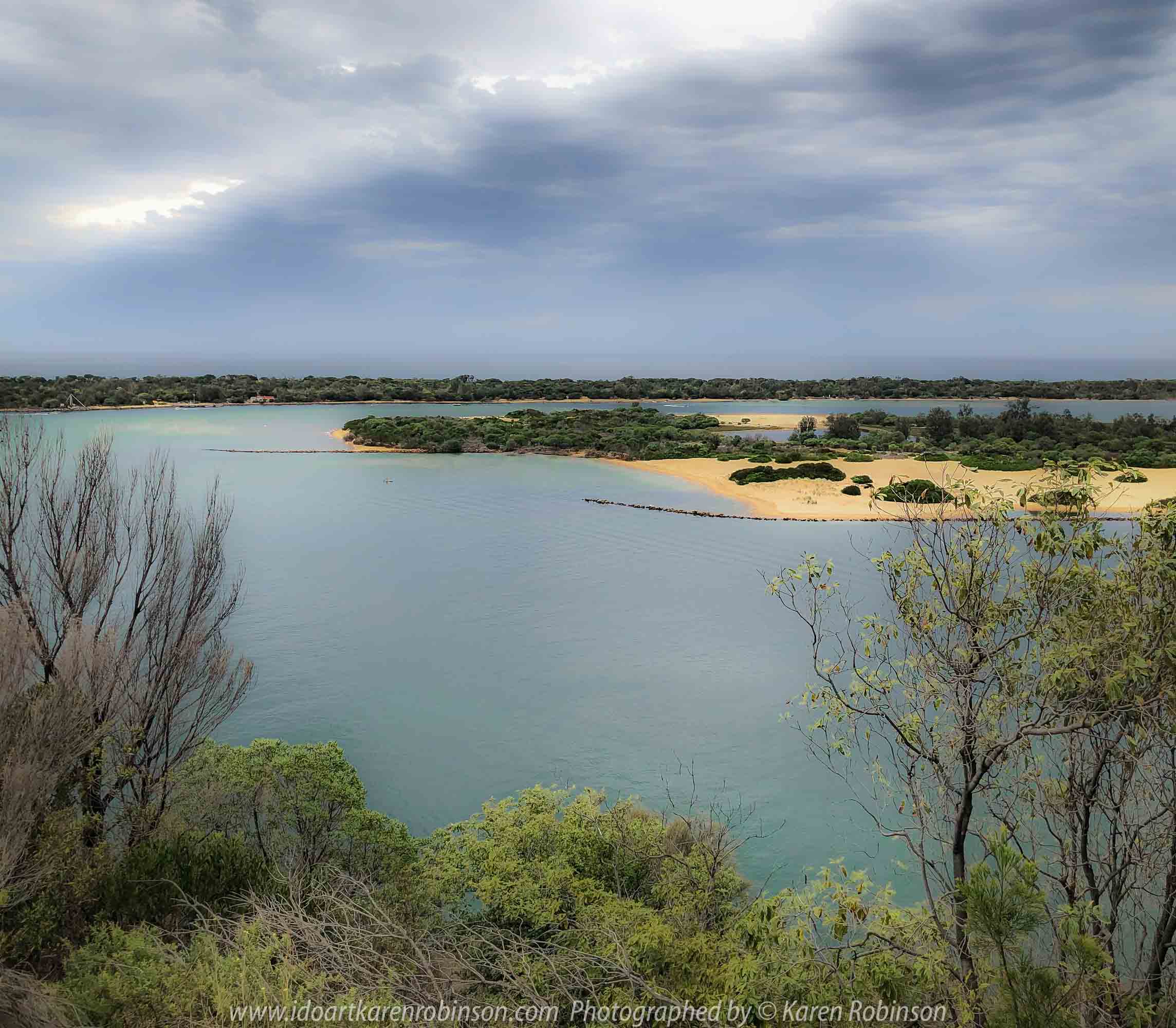 Lakes Entrance, Victoria - Australia 'Shoreline and Harbour Views' Photographed by Karen Robinson January 2019 Comments - On our way to see hubby's brother, we made a slight detour to visit this area. The weather was overcast but still pleasant. It was difficult to photography scenes I wanted and I realised that aerial shots would be best, so we went to a couple of lookouts to help capture some overview shots of Lakes Entrance.