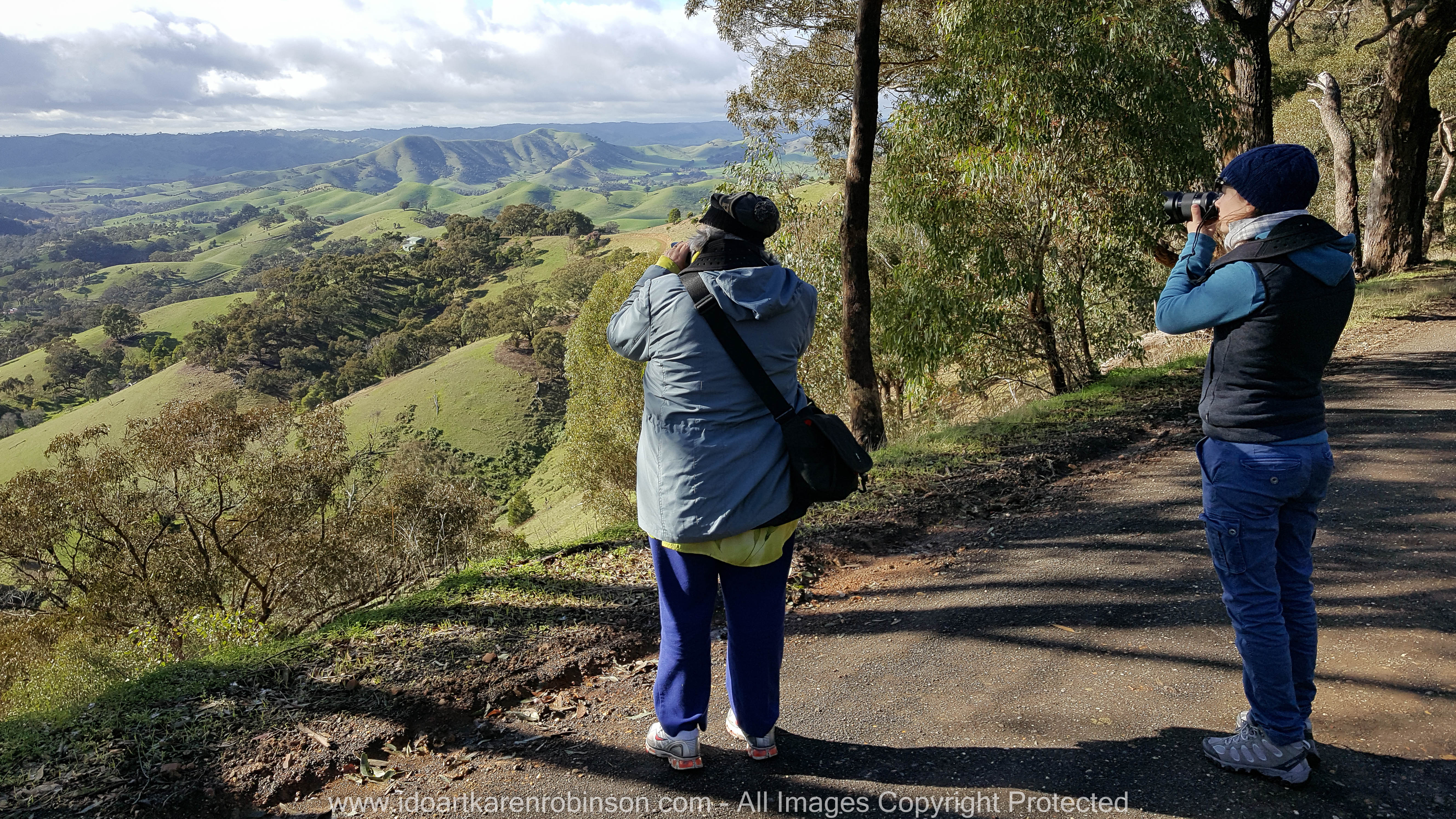 Strath Creek Region, Victoria - Australia 'Valley of a Thousand Hills' Photographed by ©Karen Robinson www.idoartkarenrobinson.com May 2017 Comments: Day photographing with my daughter and husband who kindly drove us location to location. This particular photo was taken by my husband on my Samsung Galaxy 6 Mobile Phone so we could get a GPS reading. It features myself to the left and my daughter to the right. NB: All images are protected by Copyright Laws