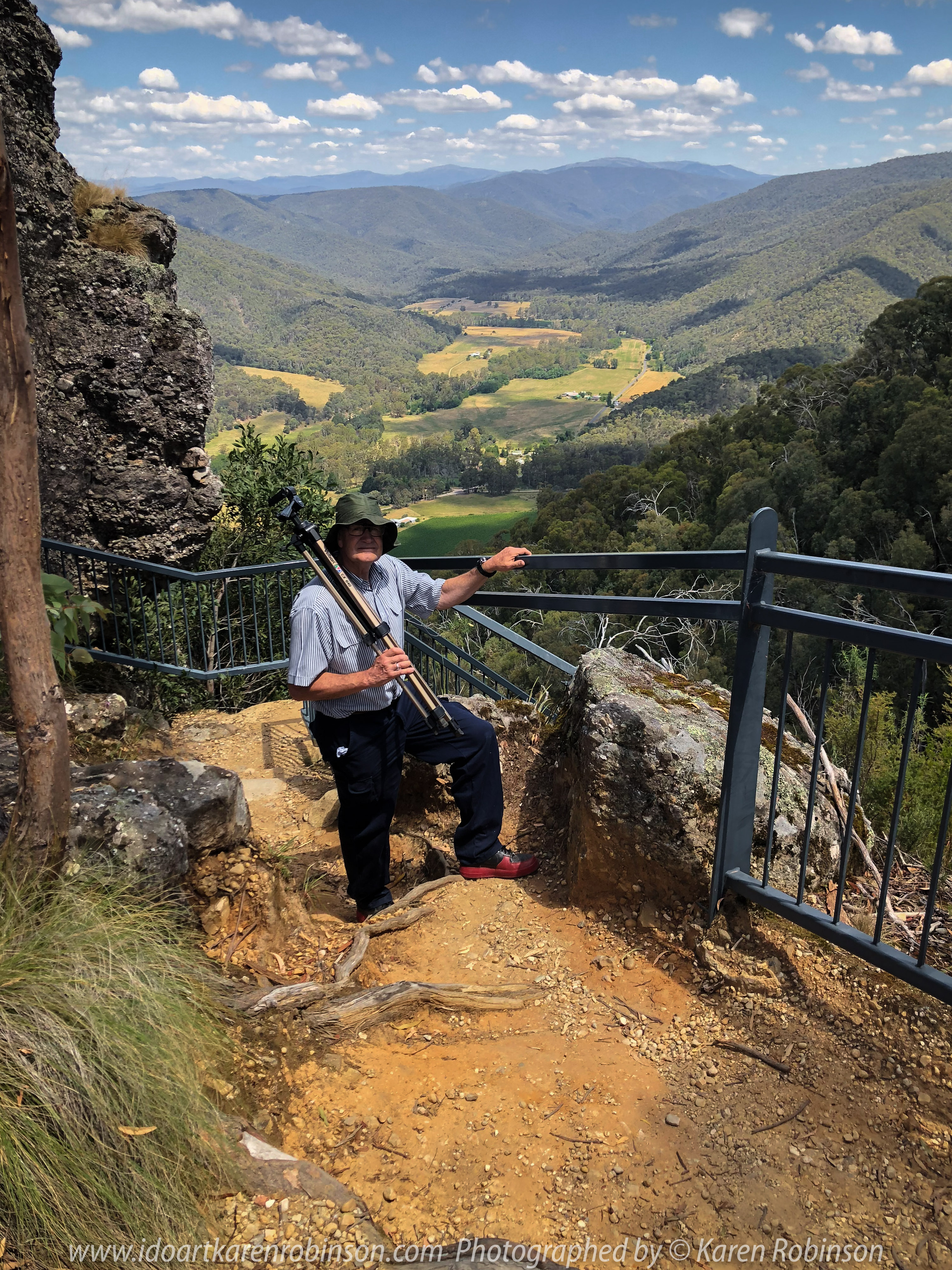 Whitlands, Victoria - Australia 'Powers Lookout' Photographed by Karen Robinson Dec 2017 www.idoartkarenrobinson.com NB. All images are protected by copyright laws. Comments: Here we had the opportunity to experience incredible views across the King River Valley. Featured here my hubby carrying photography equipment for me, up and down the steep stairs around Powers Outlook.Outlook.